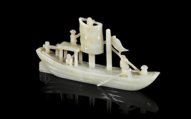 A pale green jade sailing boat with figures