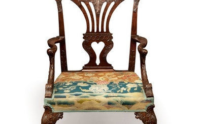 A GEORGE II MAHOGANY OPEN ARMCHAIR ATTRIBUTED TO THE ST MARTIN'S LANE SYNDICATE, CIRCA 1750