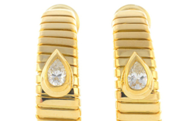 BULGARI - a pair of 18ct gold diamond 'Tubogas' earrings.