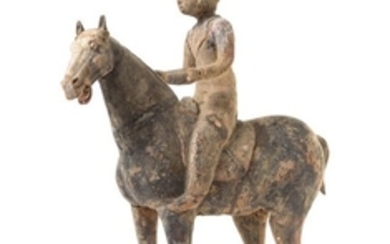 * A Chinese Grey Pottery Equestrian Figure