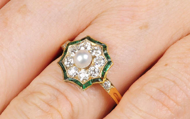 An early 20th century Austrian gold, pearl, circular-cut diamond and calibre-cut emerald ring.