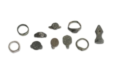 A GROUP OF BRONZE AND SILVER RINGS Roman...