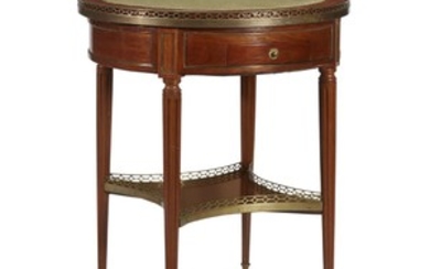 A Louis XVI brass-mounted mahogany and Carrara marble table...