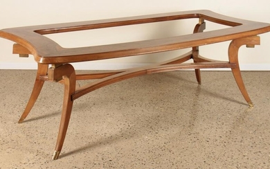 A MID CENTURY MODERN DINING TABLE WITH FLARED LEG