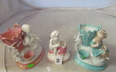 A Minton style pink and white spill vase cherub and two other spill vases girl and baskets.