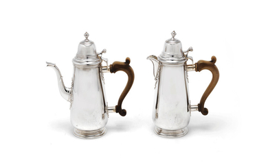 A pair of silver café au lait pots