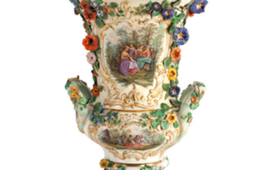 A massive Meissen flower encrusted twin handled campana vase