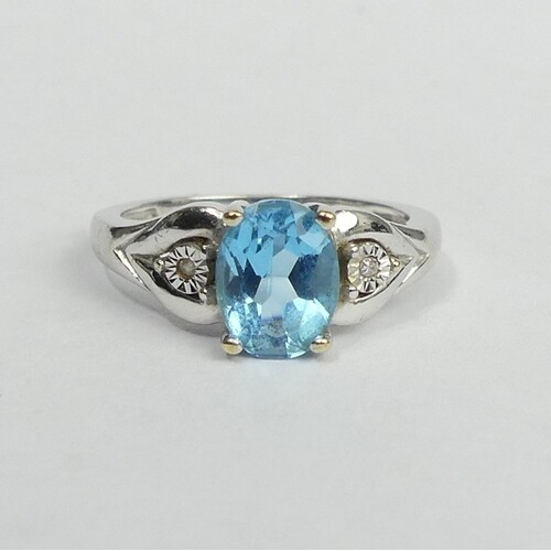 9 carat white gold blue topaz and diamond ring, 2.8 grams. S...