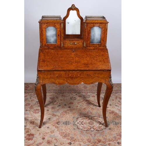 A 19TH CENTURY CONTINENTAL WALNUT AND MARQUETRY BUREAU the s...