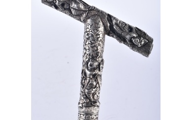 A 19TH CENTURY SOUTH EAST ASIAN SILVER MOUNTED WALKING CANE....
