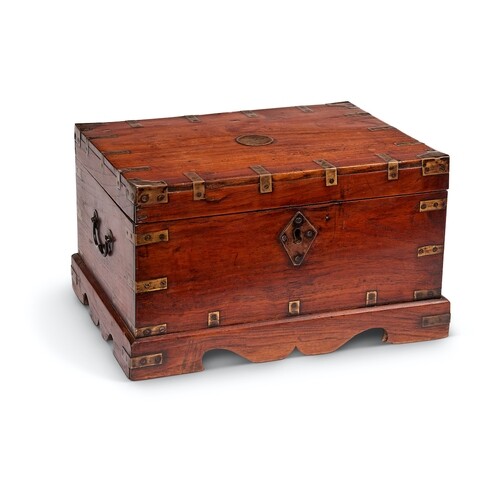 A 19th century Chinese teak and brass bound box The hinged l...