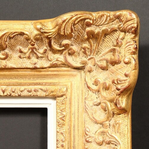 A 20th Century gilt composition frame, rebate size - 19.5" x...