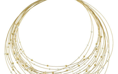 A 9ct gold multi-strand necklace, with cultured pearl highlights.