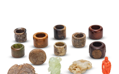 A COLLECTION OF JADE CARVINGS, JADE AND WOOD ARCHERS' RINGS...
