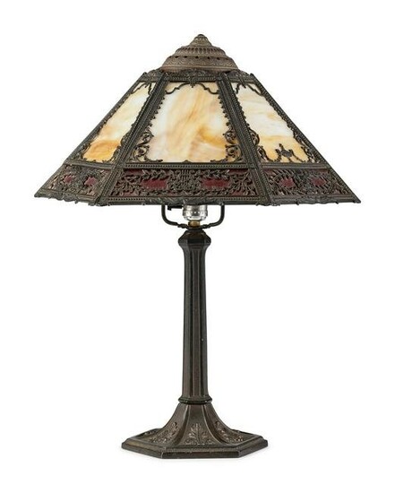 A Cast Iron and Slag Glass Table Lamp