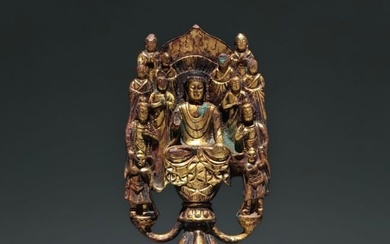 A Chinese Carved Gilt Bronze Buddha