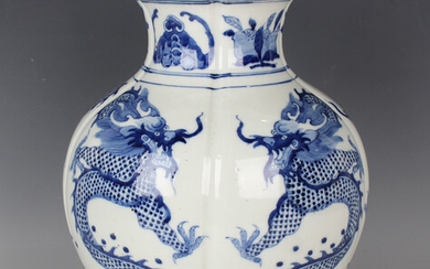 A Chinese blue and white porcelain vase, probably 20th century or later, the lobed ovoid body painte