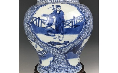A Chinese blue and white vase, decorated figures, 20 cm high...