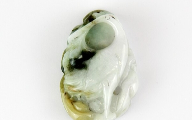 A Chinese carved jadeite jade amulet of a crane with a lotus back, H. 6cm.