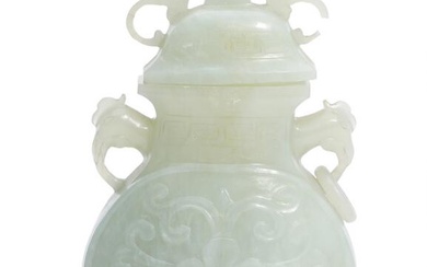 A Chinese green jade covered Hue vase, sides carved with flowers and...