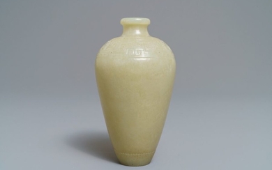 A Chinese light celadon jade relief decorated meiping...