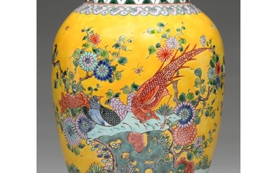 A Chinese yellow ground famille rose jar, 20th c, enamelled ...