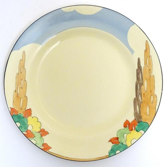 A Clarice Cliff plate, marked to reverse Bizarre by