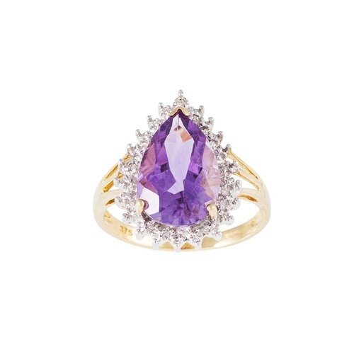 A DIAMOND AND AMETHYST CLUSTER RING, pear shaped, mounted in...