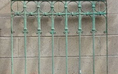 A DOME-TOP WROUGHT IRON DECORATIVE PANEL