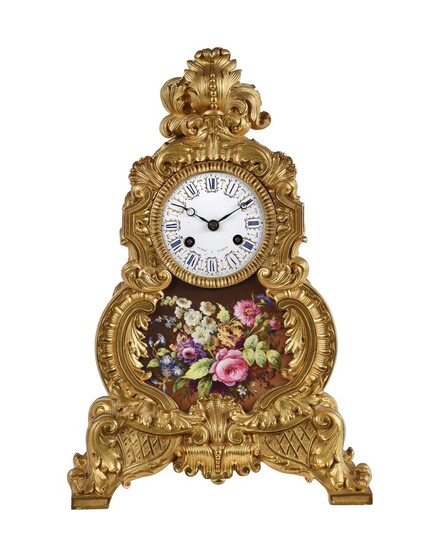 A FRENCH LOUIS PHILIPPE PORCELAIN INSET ORMOLU MANTEL CLOCK