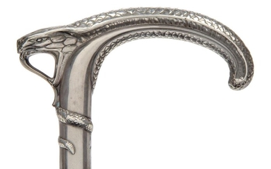 A French Art Nouveau silver Serpent head and Malacca cane, c.1900, boars head shaped French poincon for 800 standard, and maker's lozenge mark partly obscured but possibly for Charles Murat, Paris, The slender dark-stained and mottled-wood cane...