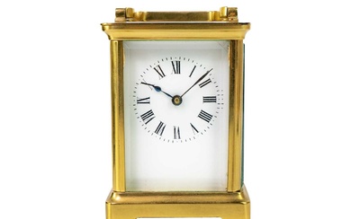 A French brass cased carriage timepiece.