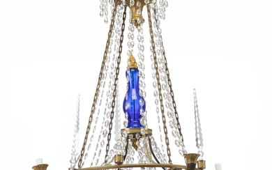 A French crystal chandelier with giltbronze frame. Blue glass column and bottom....