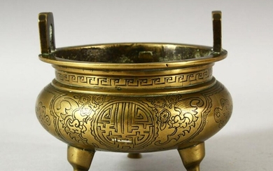 A GOOD CHINESE ENGRAVED / CHASED BRONZE TRIPOD CENSER