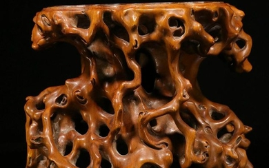 A HUANGYANG WOOD CARVED ROOT SHAPE CHAIR