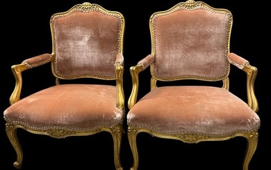 A LARGE PAIR OF LOUIS XVI STYLE GILT WOOD ARM CHAIRS