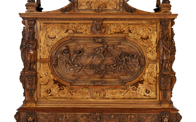 A LARGE RENAISSANCE REVIVAL CARVED OAK, WALNUT AND STAINED FRUITWOOD...