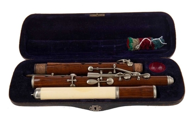 A LATE 19TH/EARLY 20TH CENTURY IVORY MOUNTED ROSEWOOD FLUTE