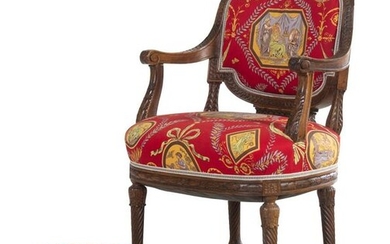 A Louis XVI Style Carved Armchair and Stool with