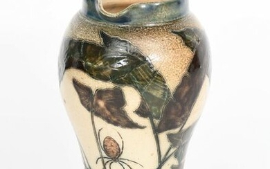 A Martin Brothers stoneware jug by Robert Wallace Martin, swollen cylindrical form, incised with a spider hanging from a large leaf by a thread, two web's incised in the body, glazed in shades of green and brown on a buff ground, incised R W Martin...