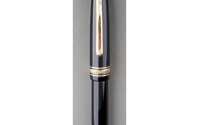 A Montblanc Meisterstuck black fountain pen with gilt fittin...