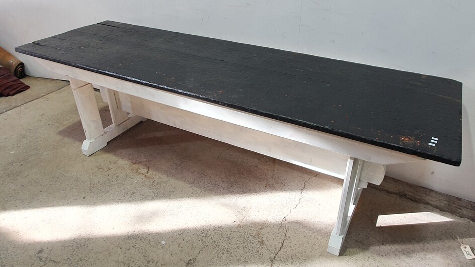 A PAINTED PINE STRETCHER BASED TABLE
