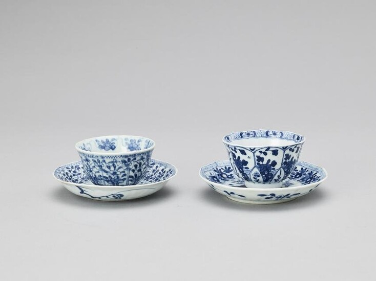 A PAIR OF BLUE AND WHITE PORCELAIN CUPS WITH PLATES