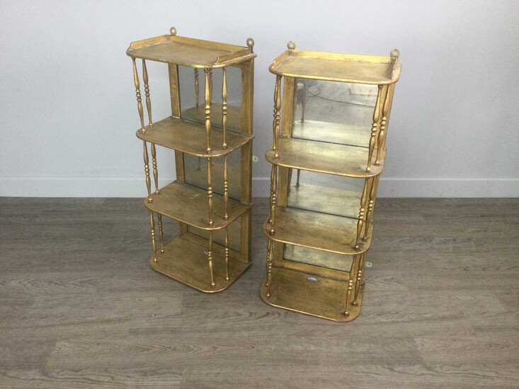A PAIR OF VICTORIAN GILT PAINTED HANGING WALL SHELVES