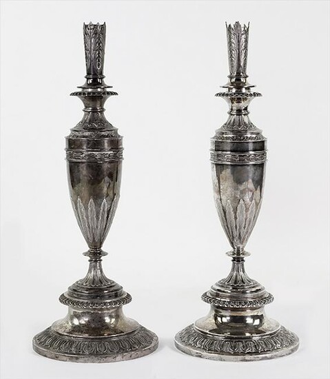 A Pair of English Victorian Silver Candlesticks.
