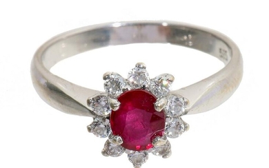 A RUBY & DIAMOND RING SET IN 14K GOLD