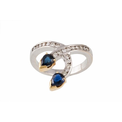 A SAPPHIRE AND DIAMOND DRESS RING, with sapphires of approx ...