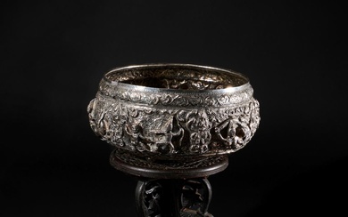 A SILVER BURMESE BOWL & WOODEN STAND, 19TH CENTURY