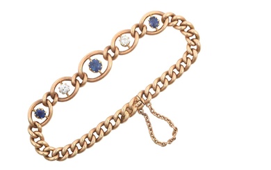 A Sapphire and Diamond Bracelet three graduated oval cut sapphires...