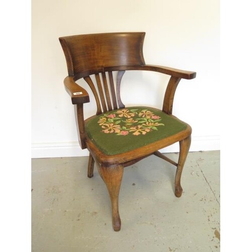A beechwood desk chair with upholstered seat
